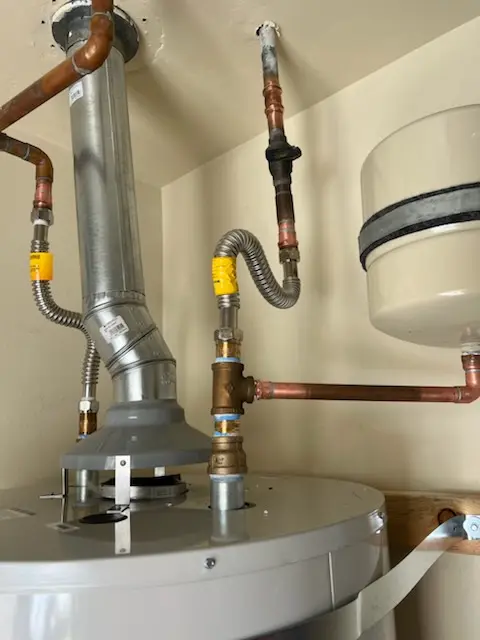 Water heater installation and plumbing repair in Pueblo Del Rio Public Housing
